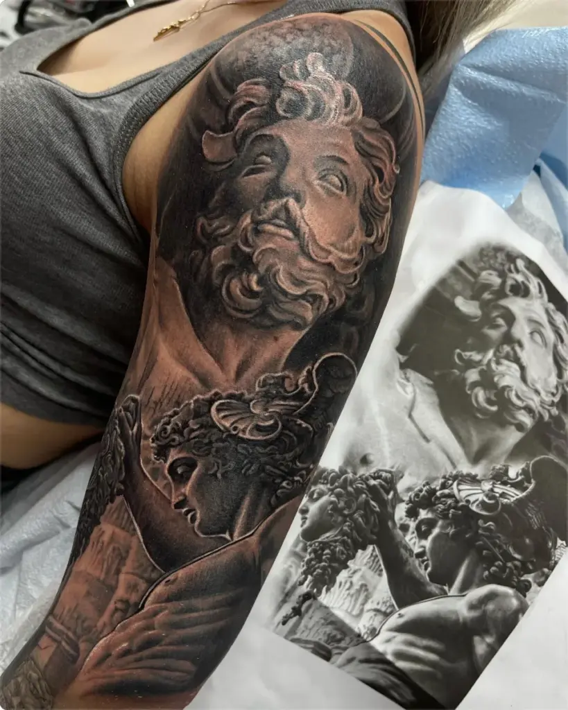 Black and grey Greek statue sleeve tattoo by Moose, Calgary Tattoo Company