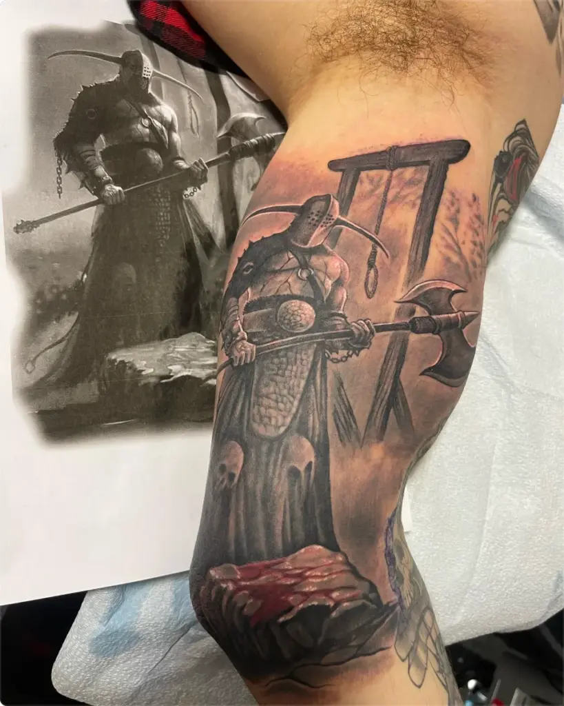 Black and grey hooded executioner tattoo by Moose, Calgary Tattoo Company