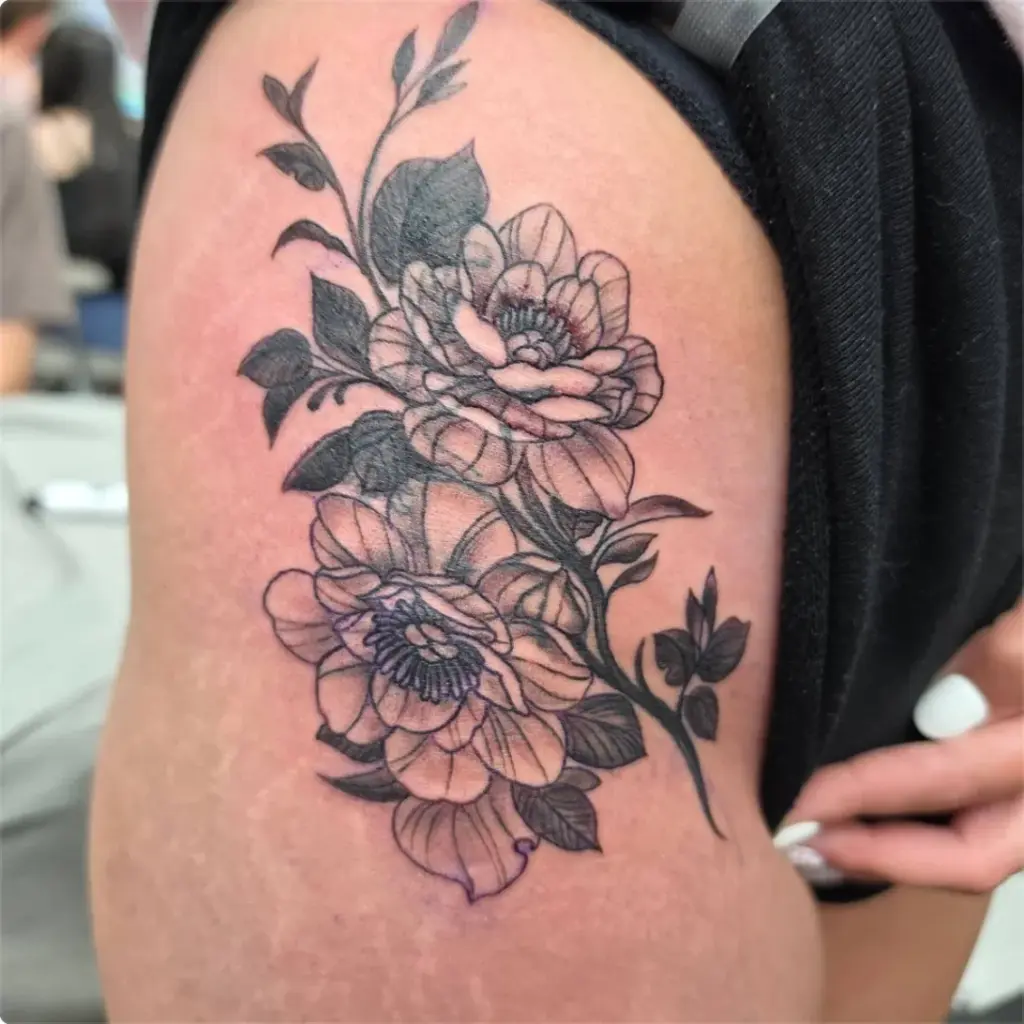 Black and grey peonies tattoo by Tonka, Calgary Tattoo Company