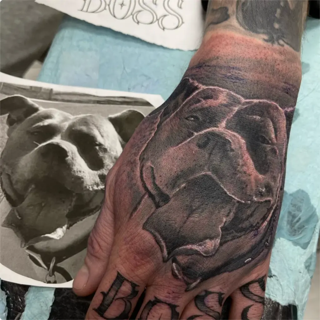 Black and grey pit bull portrait tattoo by Moose, Calgary Tattoo Company