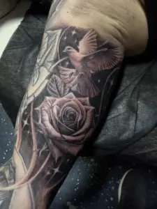 Black and grey rose and dove tattoo by Moose, Calgary Tattoo Company