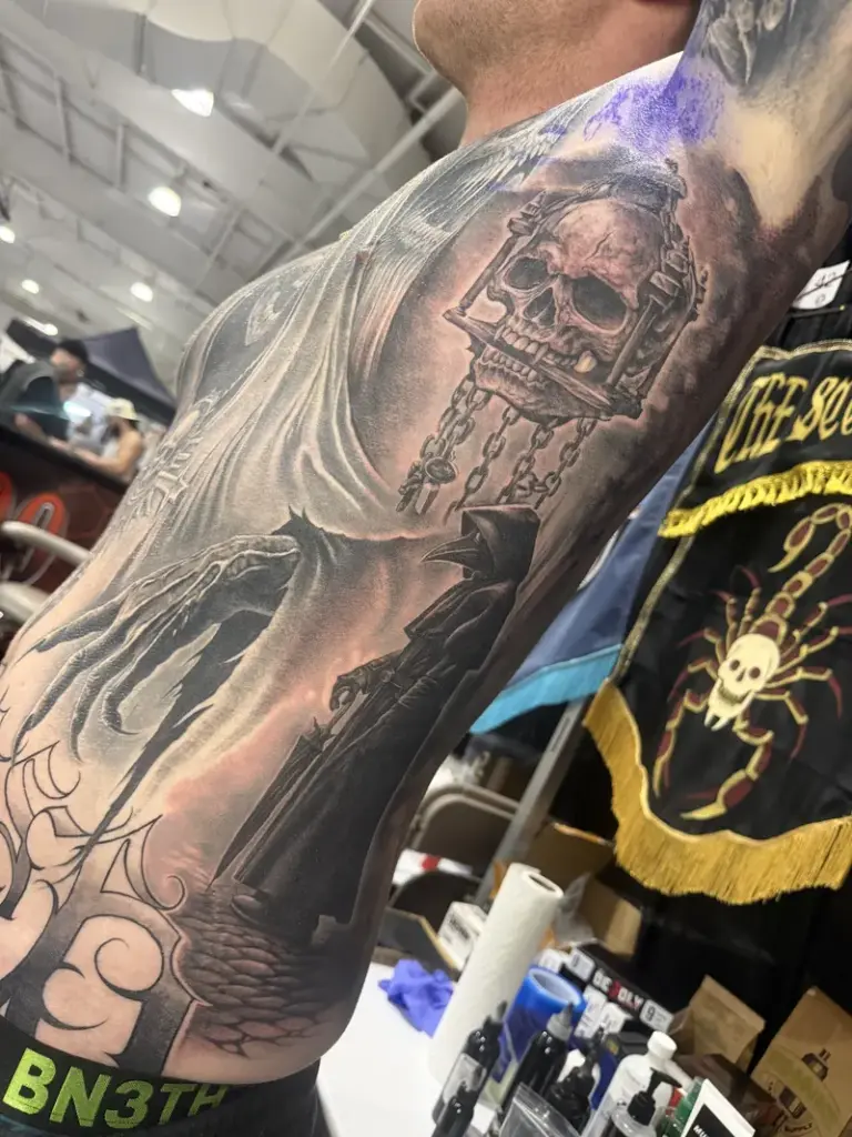 Black and grey sleeve tattoo by Moose, Calgary Tattoo Company