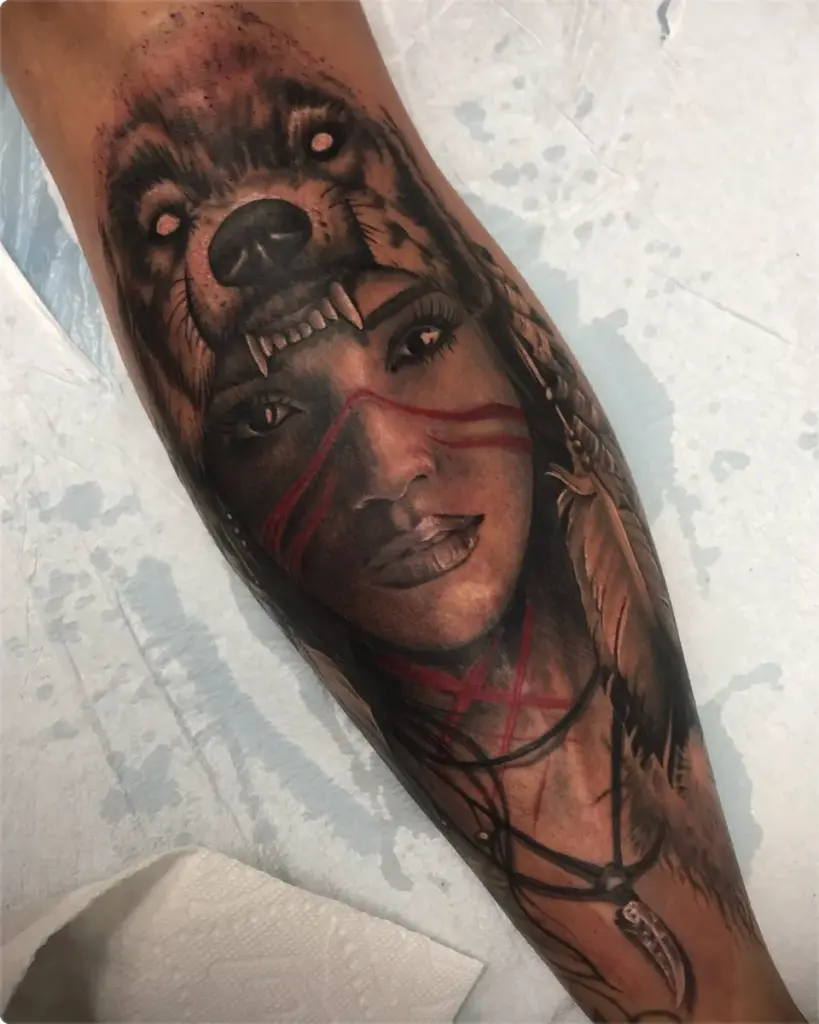 Black and grey woman in a wolf headdress tattoo by Moose, Calgary Tattoo Company
