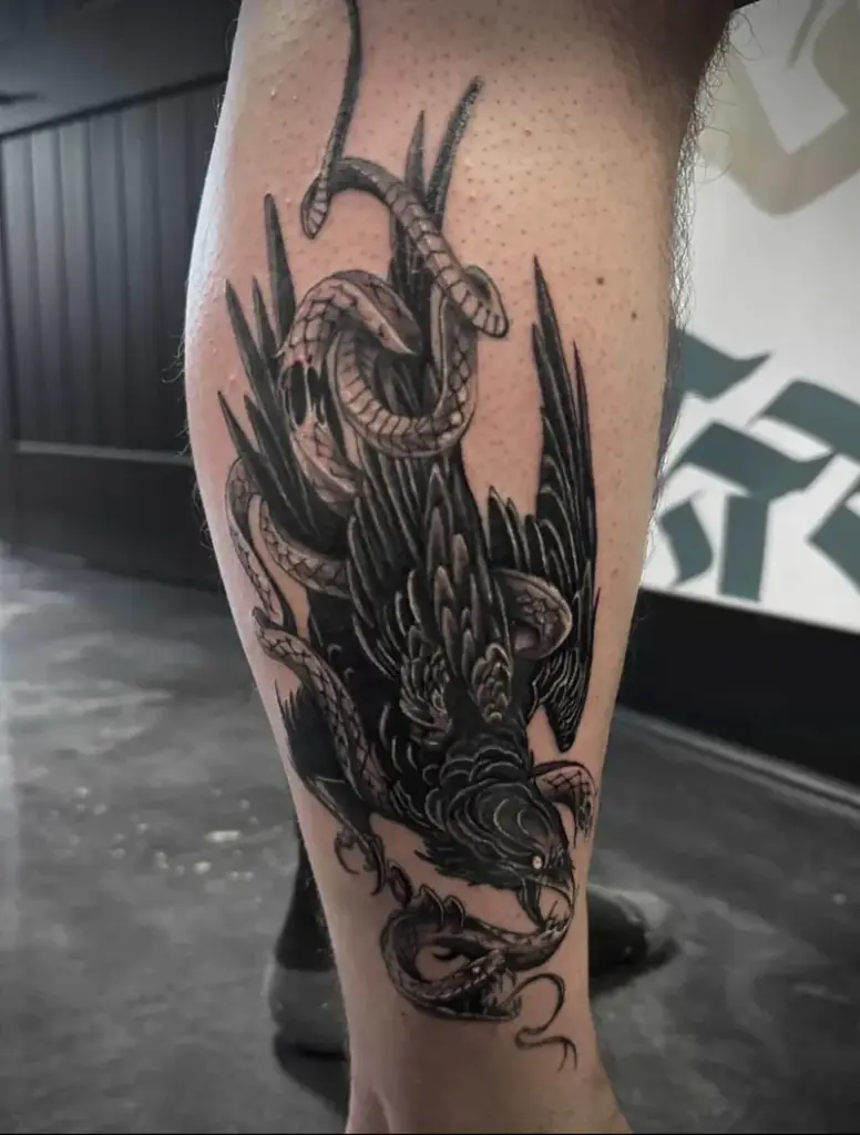 Eagle and snake tattoo by Kylie, Calgary Tattoo Company