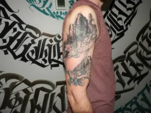 Trout with mountains and flowers tattoo by Keith, Calgary Tattoo Company